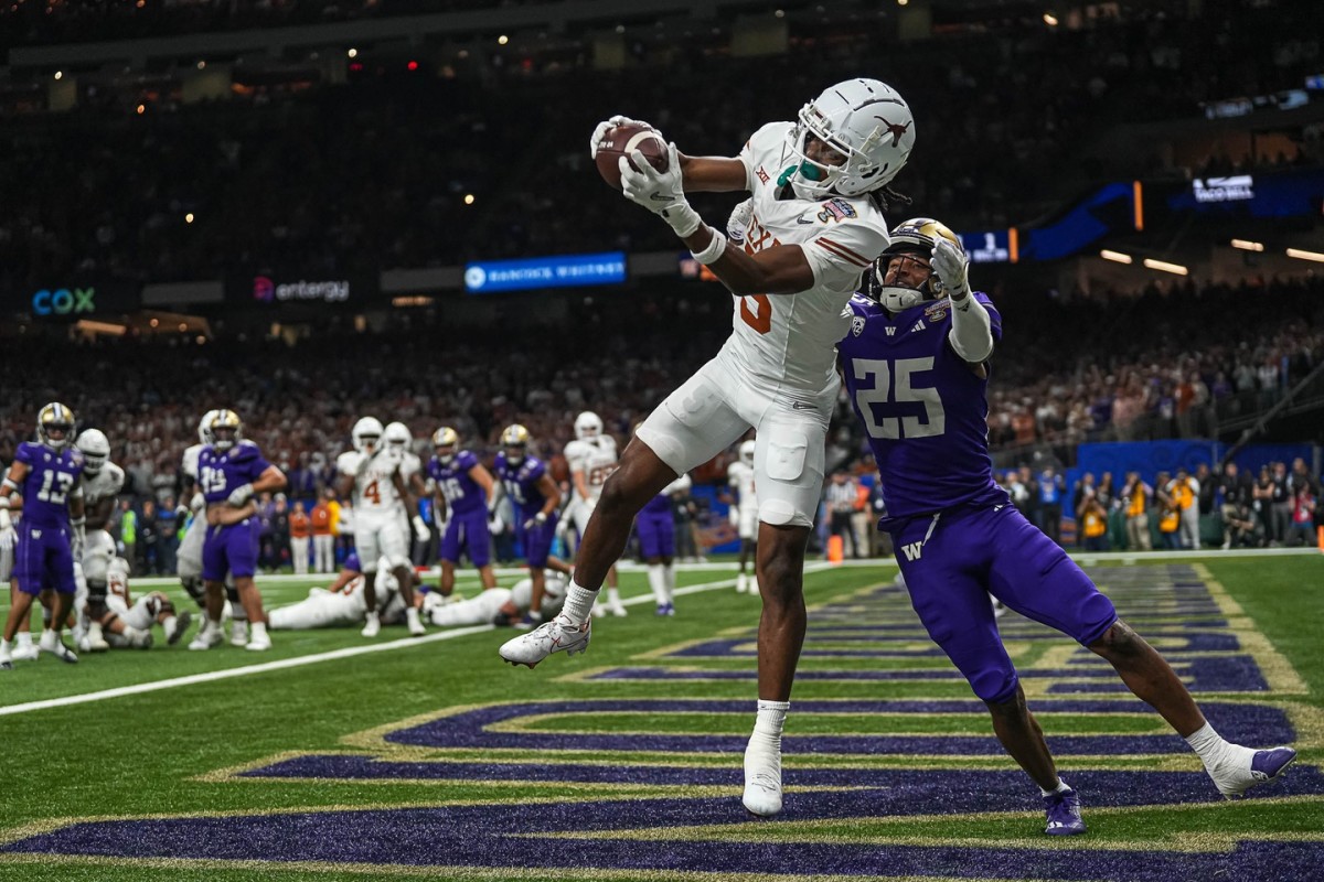 Texas wide receiver Adonai Mitchell said he studies Las Vegas Raiders star Davante Adams' tape to improve his own game.